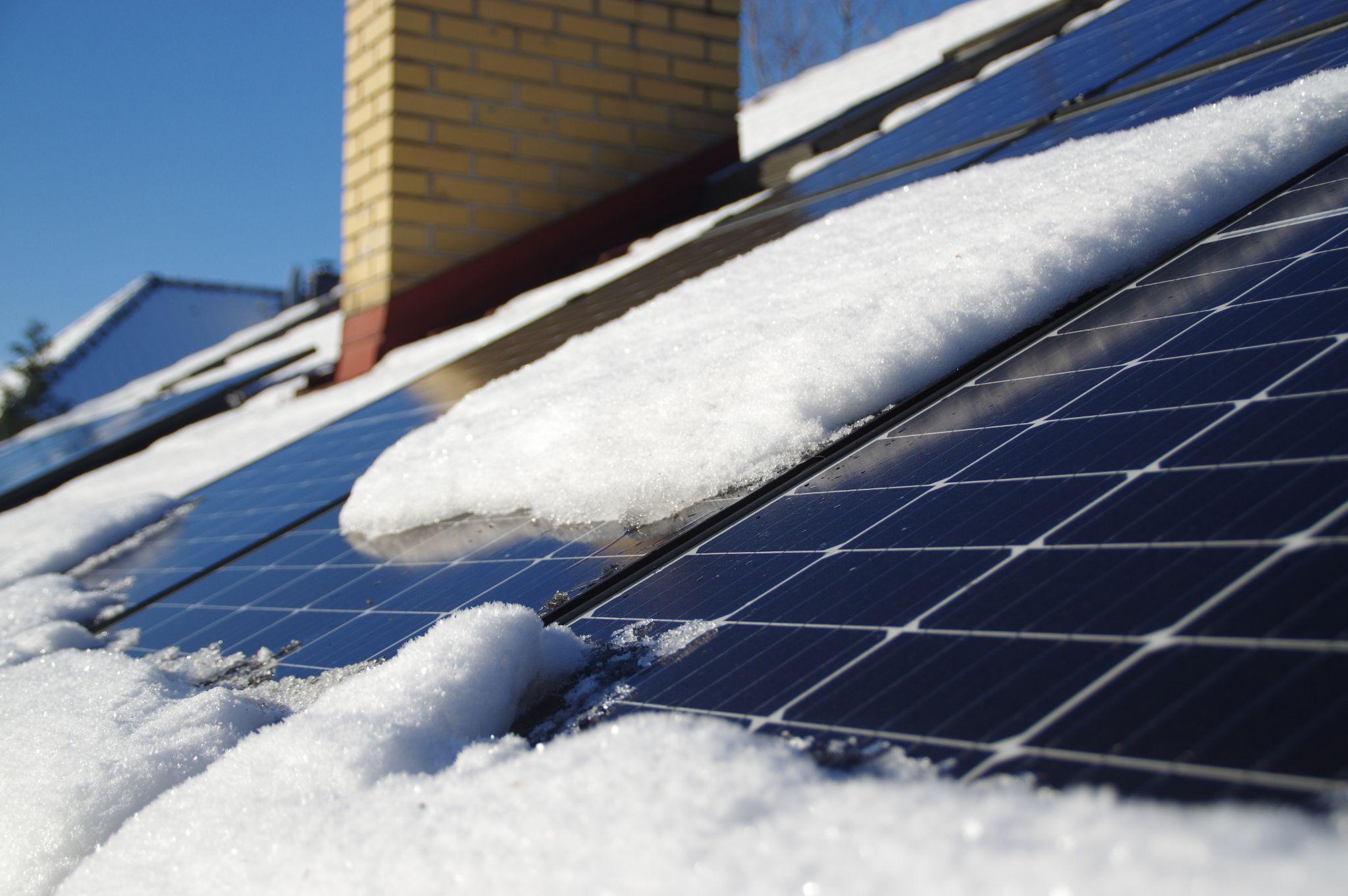 Solar Works in Winter, Snow on Solar Panels